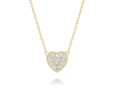 A close-up of a diamond heart necklace made of 14kt yellow gold. The necklace features a heart-shaped pendant set with sparkling diamonds. The yellow gold of the necklace is warm and inviting, making it a perfect choice for a woman who wants to add a touch of luxury to her look.