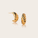Image of a pair of gold croissant earrings. The earrings are made of solid 10kt gold and have a croissant-shaped design. They are 15mm wide and 7mm thick.