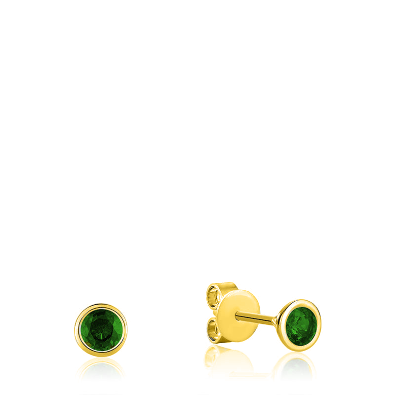 A pair of emerald earrings made of 10kt yellow gold. The earrings feature a bezel mount that protects the emeralds and highlights their beauty. The earrings are versatile and can be worn with a variety of different looks.