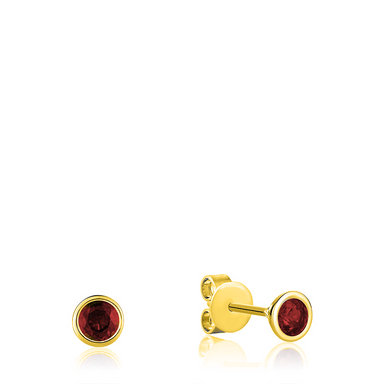 Image of a pair of earrings with two garnets set in a bezel setting in 10kt yellow gold.