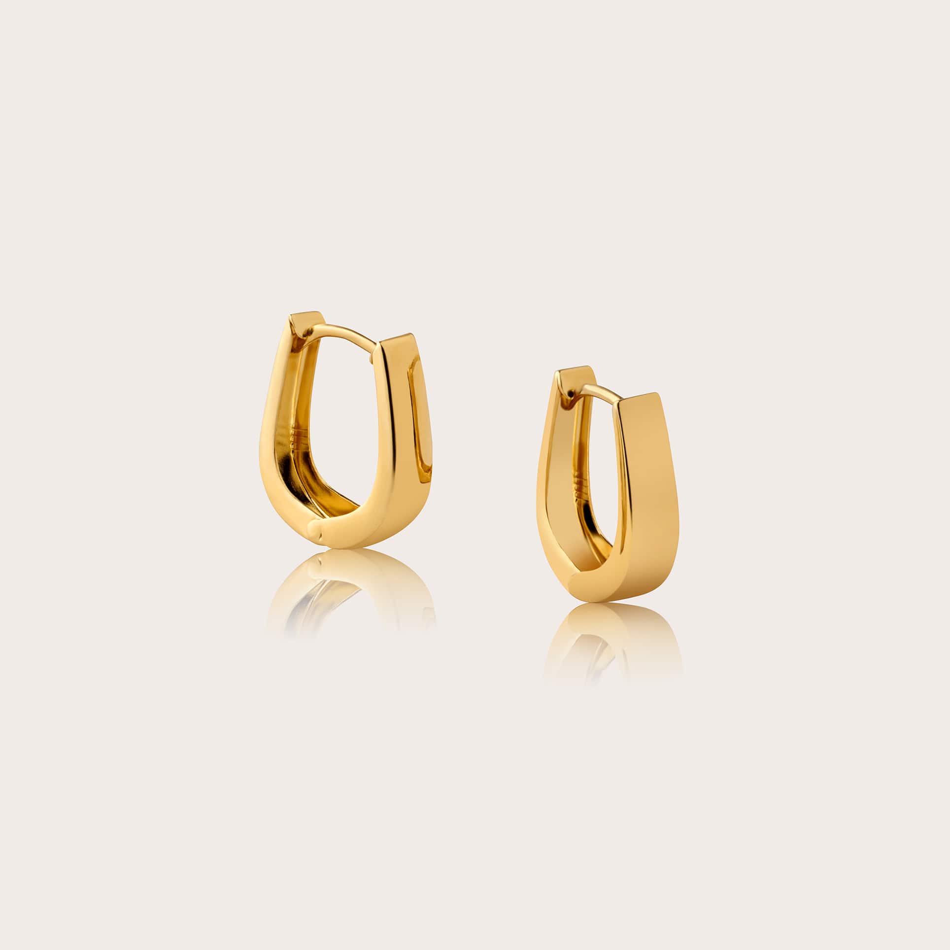 Solid 10kt gold Block Mini Huggie Hoop Earrings, 11mm length and 3mm tapered thickness, featuring a sleek and modern design perfect for everyday wear.